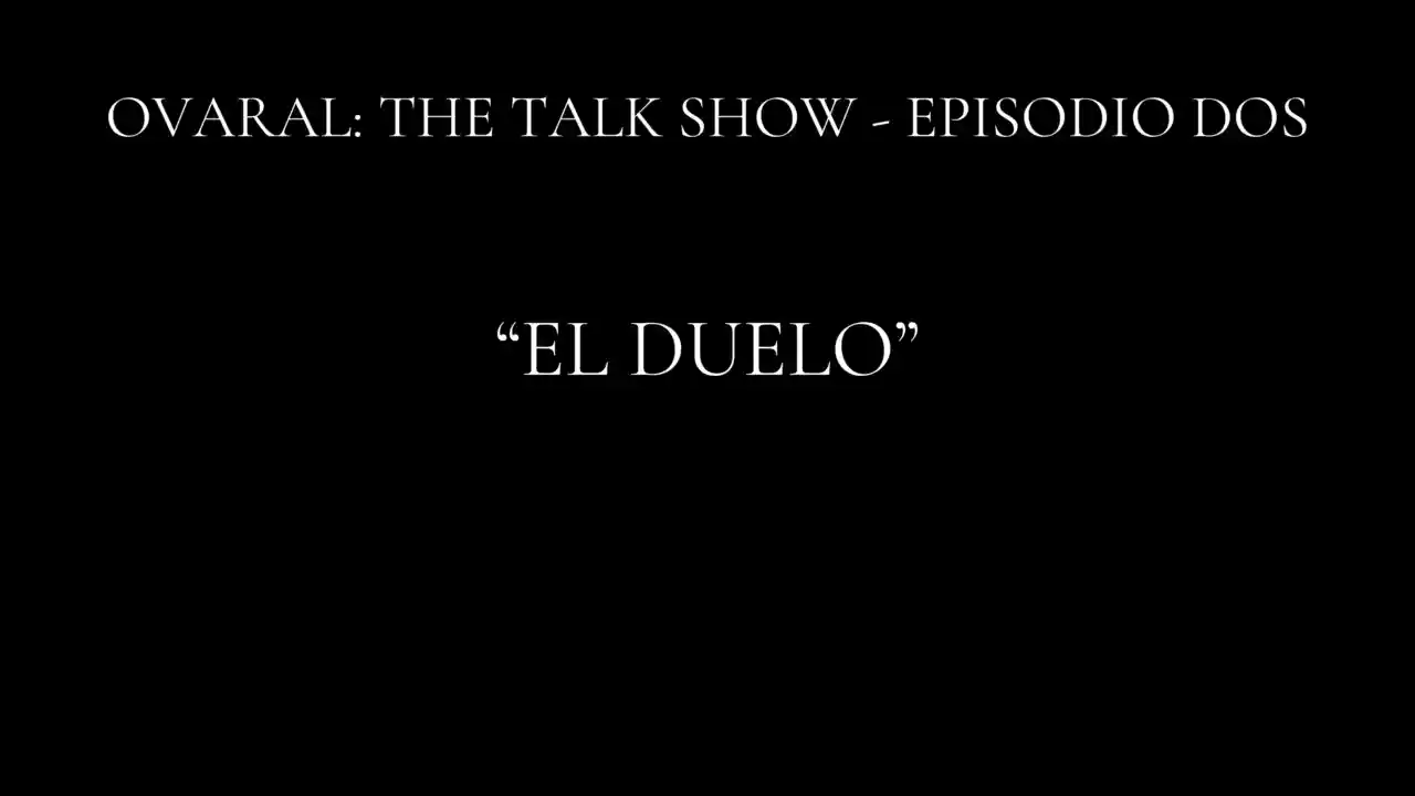 Placa negra de OVARAL: THE TALK SHOW con el título El duelo.